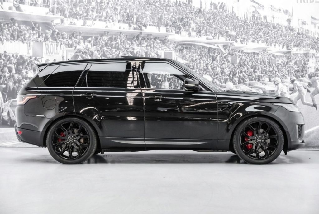 Black 2022 Land Rover Range Rover Sport, side profile, available for hire in Sydney