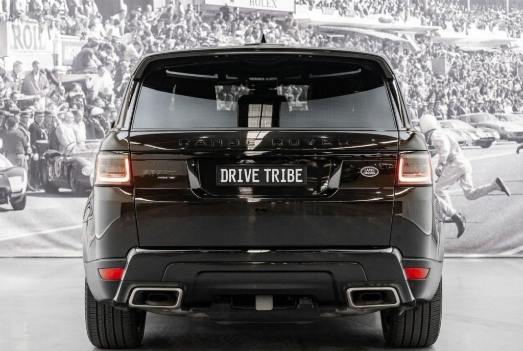 Black 2022 Land Rover Range Rover Sport, rear view, available for hire in Sydney