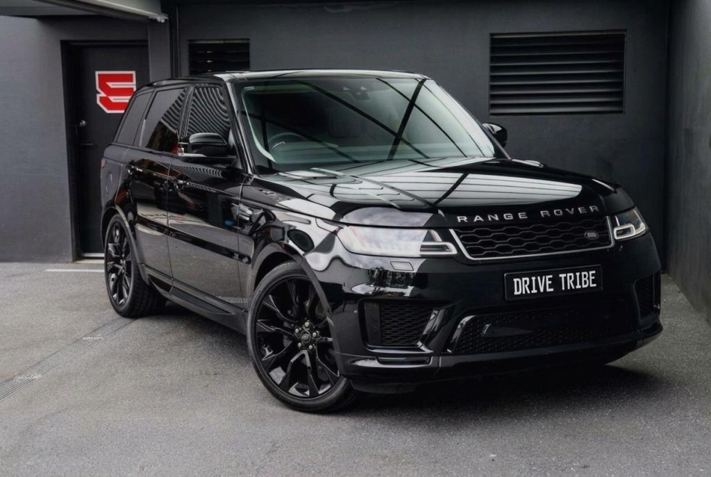 Black 2020 Land Rover Range Rover Sport 7-Seat, front three-quarter view, available for hire in Sydney