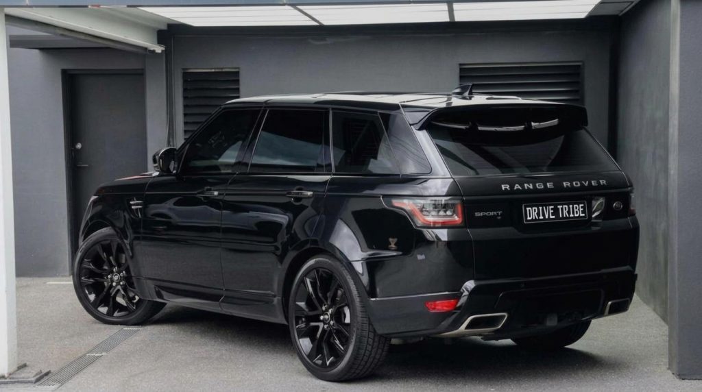 Black 2020 Land Rover Range Rover Sport 7-Seat, rear three-quarter view, available for hire in Sydney