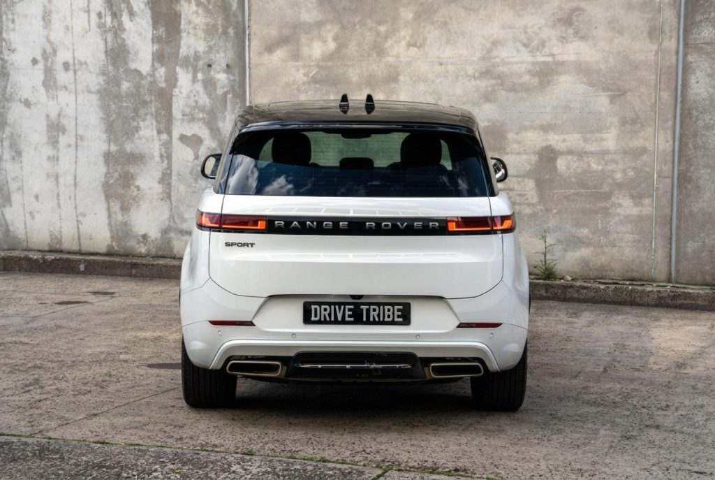 White 2023 Land Rover Range Rover Sport, rear view, available for hire in Sydney