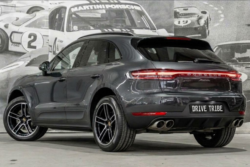 Grey 2019 Porsche Macan, rear three-quarter view, available for hire in Sydney