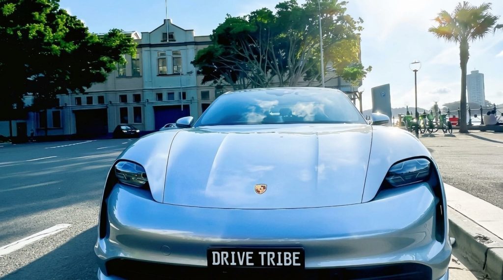 Silver 2021 Porsche Taycan Turbo, front view, available for hire in Sydney