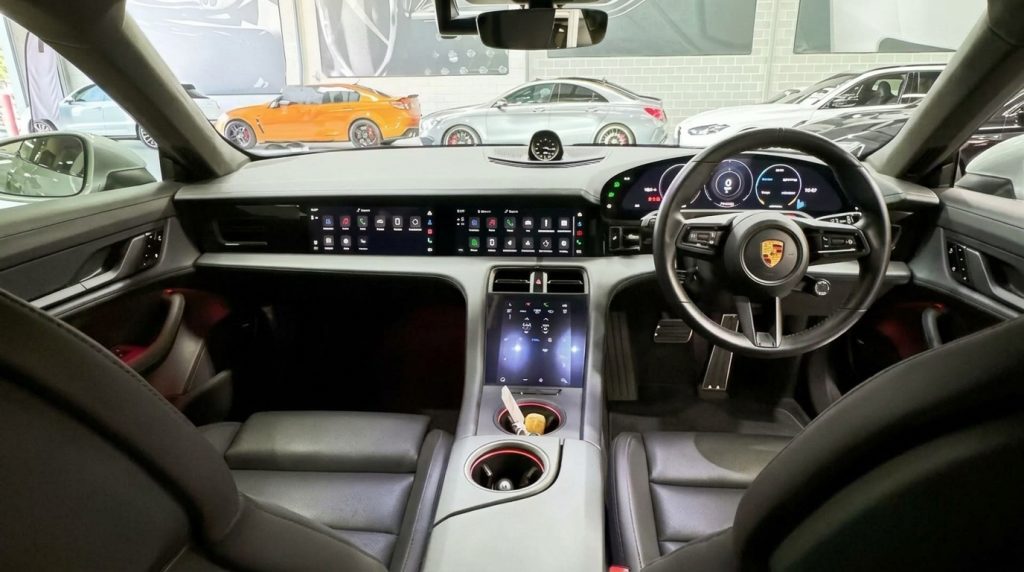 Dashboard of the silver 2021 Porsche Taycan Turbo, available for hire in Sydney