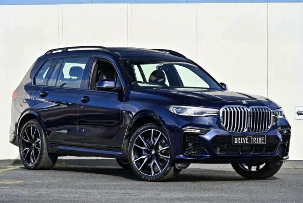 Blue 2019 BMW X7 xDrive30d, front three-quarter view, available for hire in Sydney