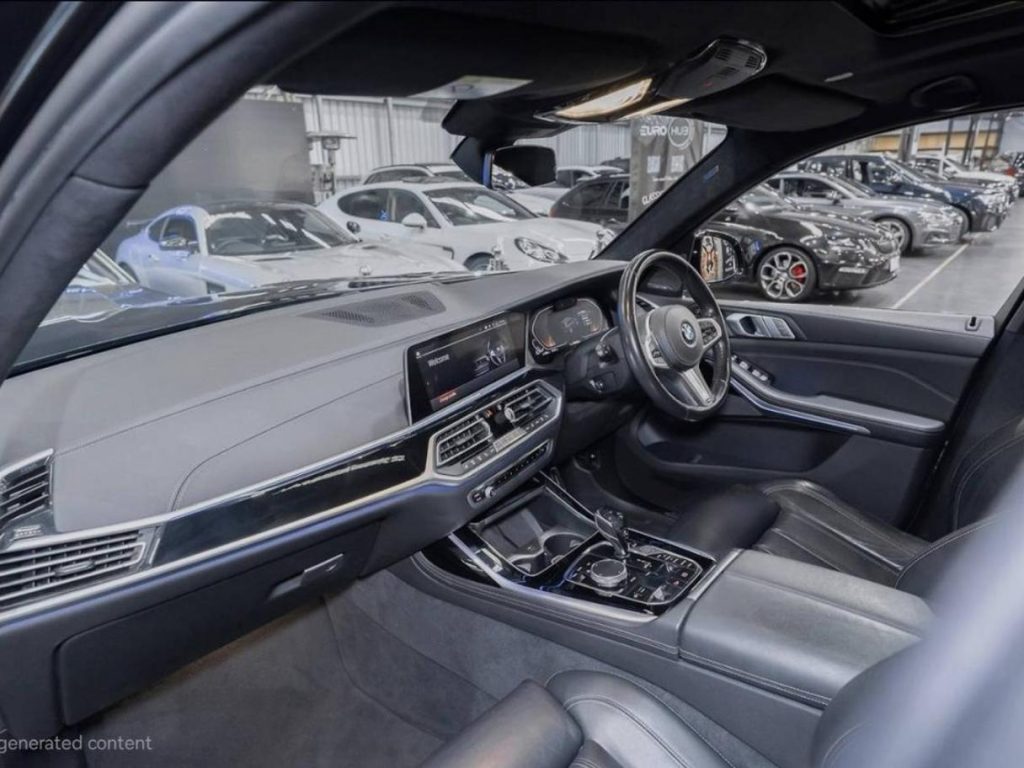 Dashboard of the blue 2019 BMW X7 xDrive30d, available for hire in Sydney