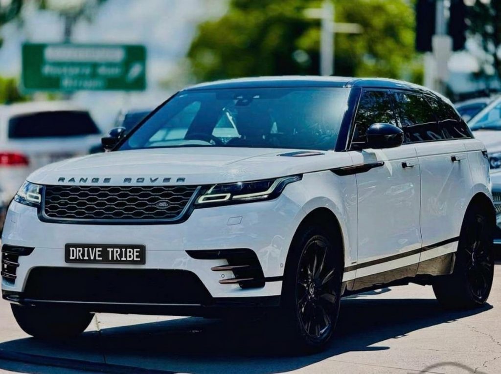 White 2018 Land Rover Range Rover Velar, front three-quarter view, available for hire in Sydney