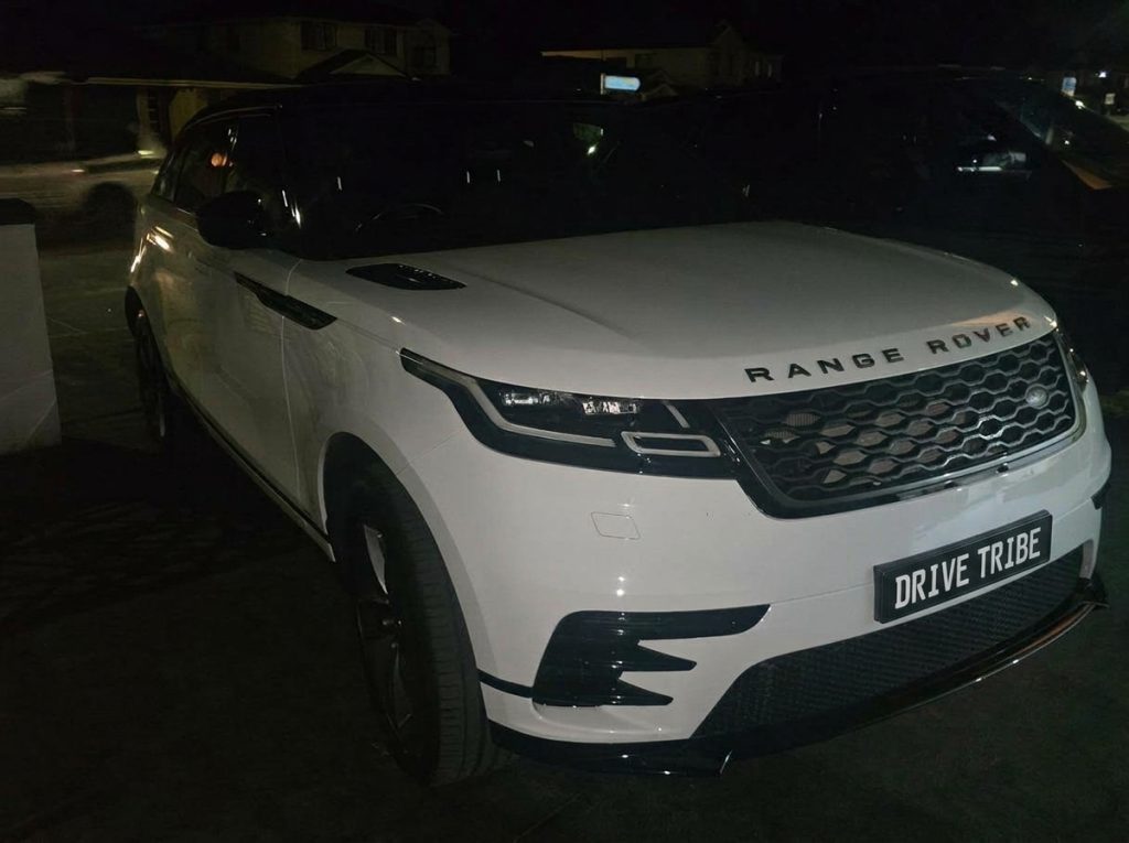 White 2018 Land Rover Range Rover Velar, front three-quarter view, available for hire in Sydney