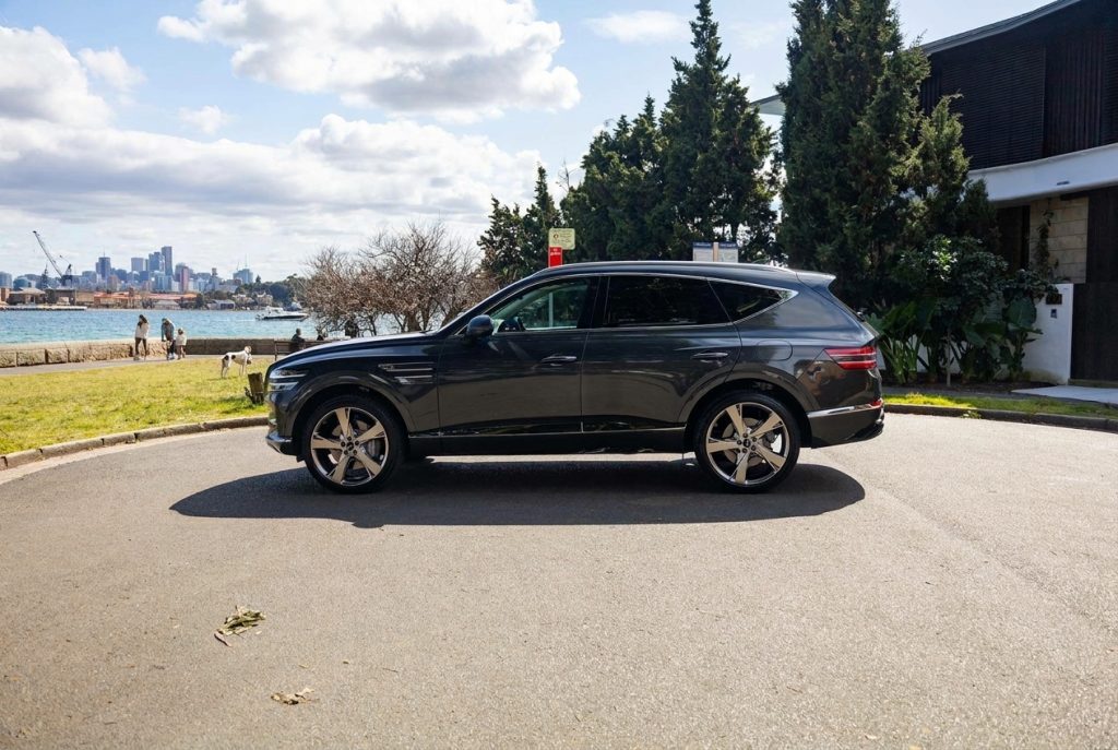 Grey 2023 Genesis GV80 3.0D Lux 7-Seat, side profile, available for hire in Sydney