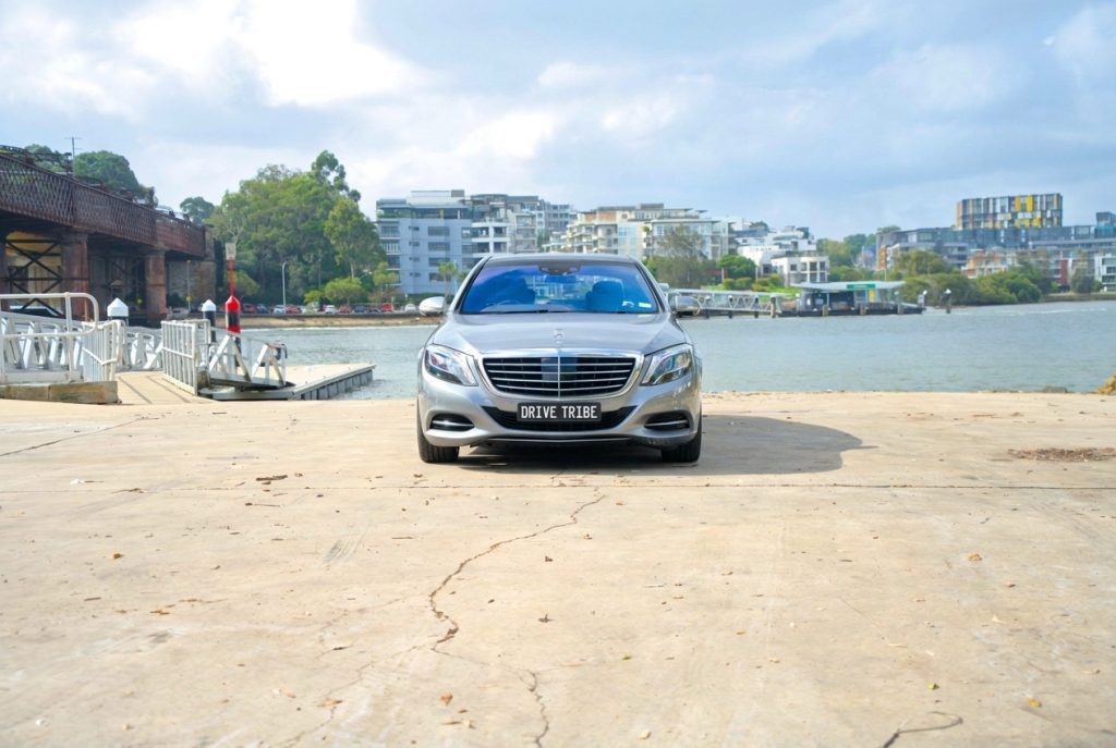 Silver 2015 Mercedes-Benz S500 L, front view, available for hire in Sydney