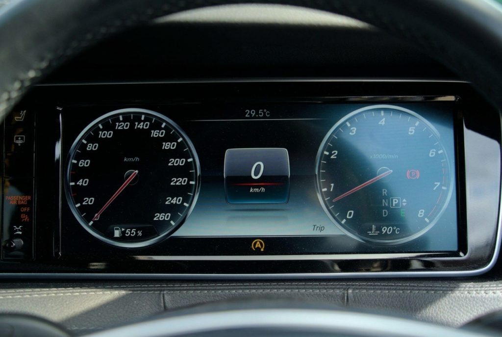 Instrument cluster of the silver 2015 Mercedes-Benz S500 L, available for hire in Sydney