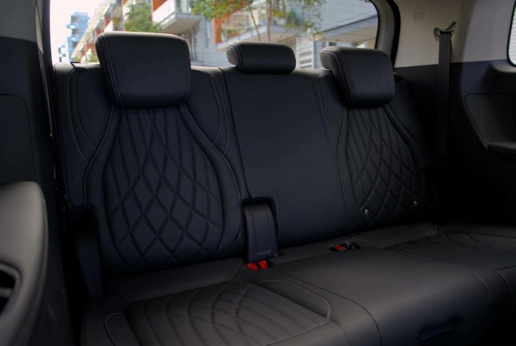 Third-row seats of the black 2023 LDV MIFA Luxe, available for hire in Sydney