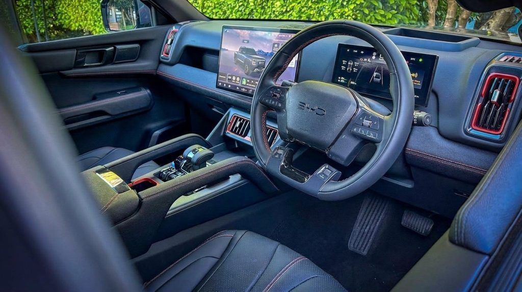 Dashboard of the black 2026 BYD Shark 6 Premium, available for hire in Sydney