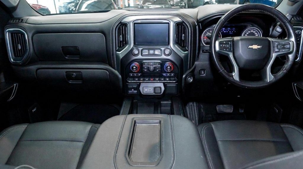 Dashboard of the black 2022 Chevrolet Silverado 1500 Trail Boss, available for hire in Sydney