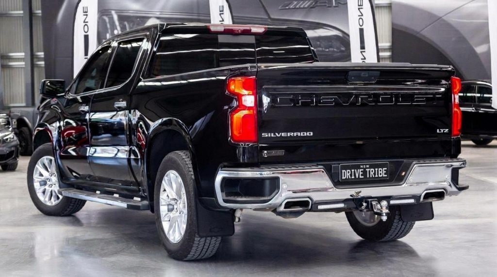 Black 2022 Chevrolet Silverado 1500 Trail Boss, rear three-quarter view, available for hire in Sydney