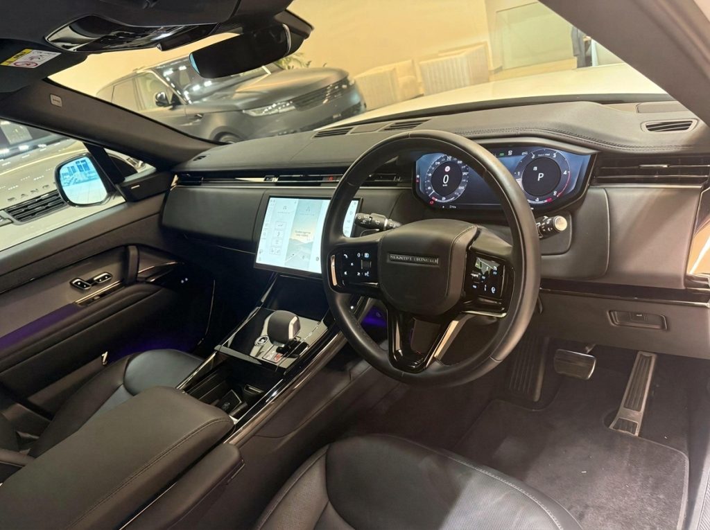 Dashboard of the white 2024 Land Rover Range Rover Sport D300 SE Dynamic, available for hire in Sydney