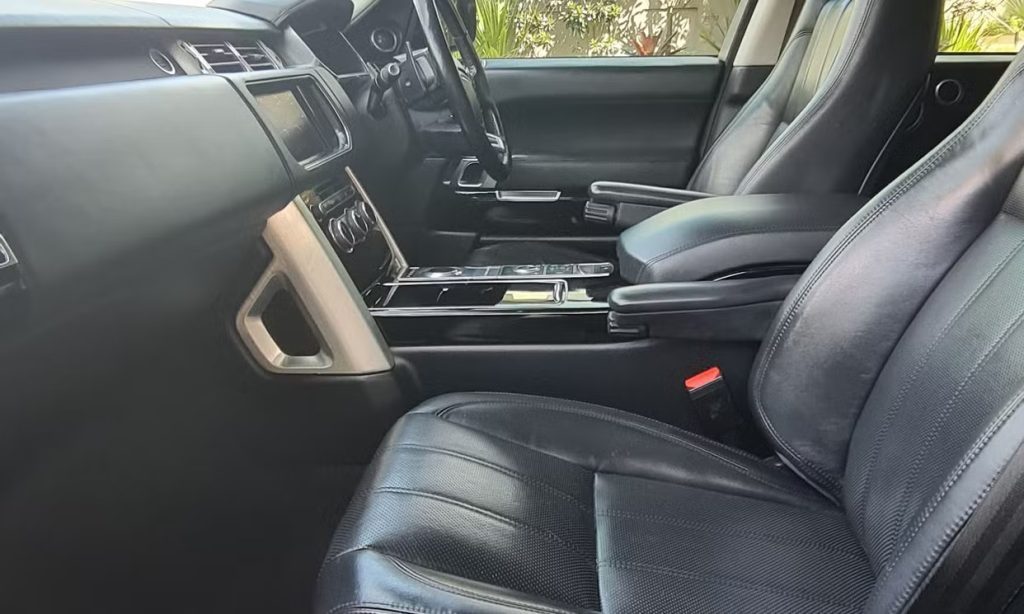 Front seats of the grey 2013 Land Rover Range Rover Vogue, available for hire in Sydney