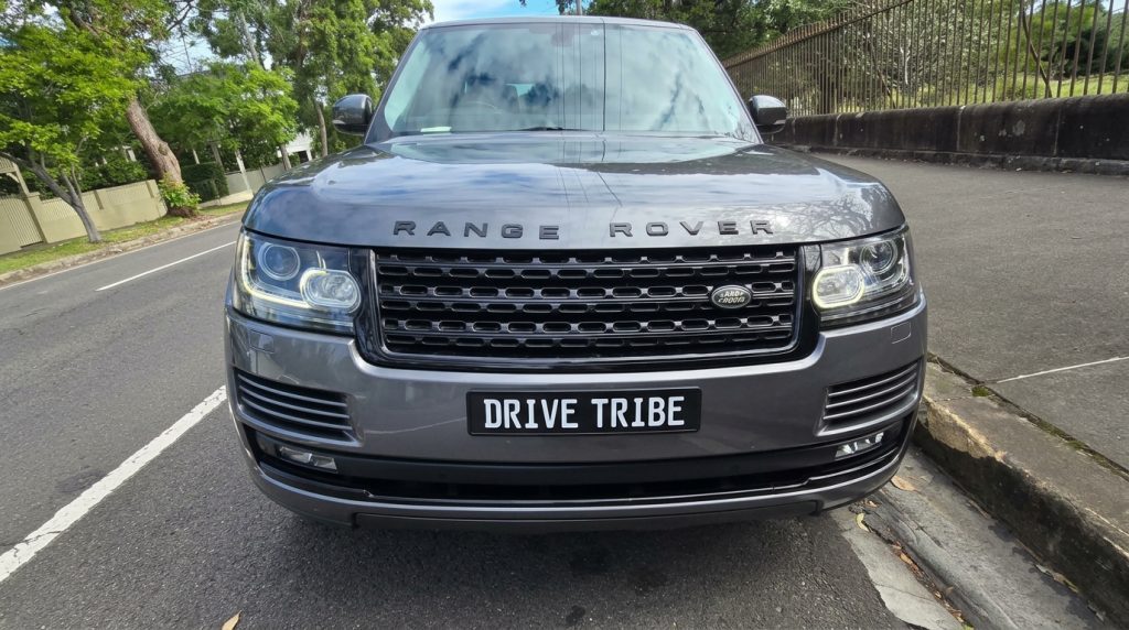 Grey 2013 Land Rover Range Rover Vogue, front view, available for hire in Sydney