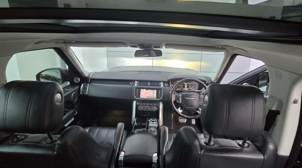 Interior of the grey 2013 Land Rover Range Rover Vogue, available for hire in Sydney